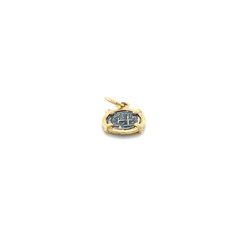 Pure Silver Atocha coin wrapped in 14k Gold