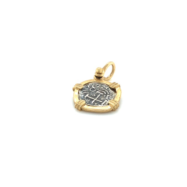 Pure Silver Atocha coin wrapped in 14k Gold