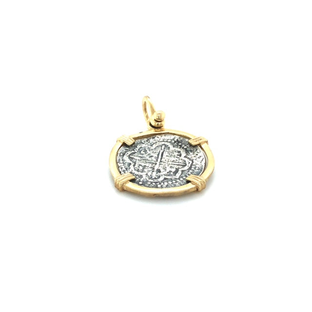 Pure Silver Atocha coin wrapped in 14k Gold