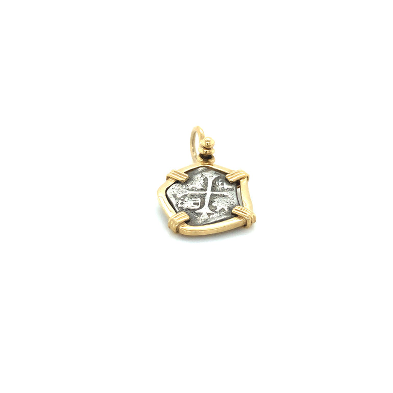Pure Silver Atocha coin wrapped in 14k Gold