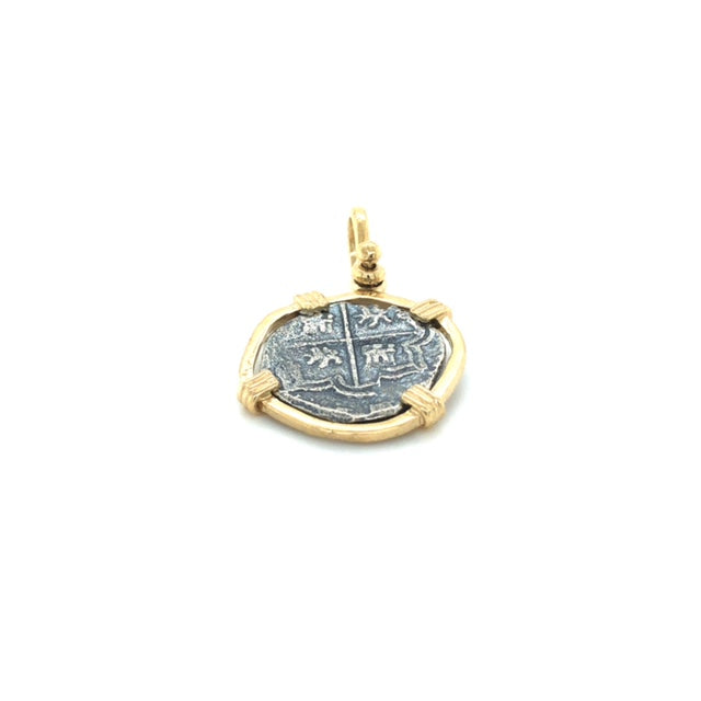Pure Silver Atocha coin wrapped in 14k Gold