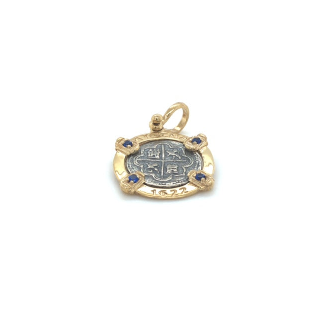Pure Silver Atocha Coin wrapped in 14k gold with sapphires